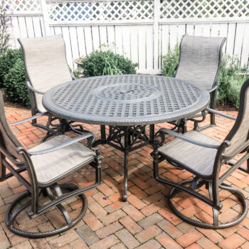 Bel Air Sling by Gensun round cast aluminum dining table and 4 sling swivel chairs